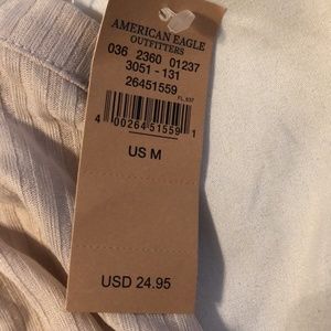 Beige tank top. Size medium